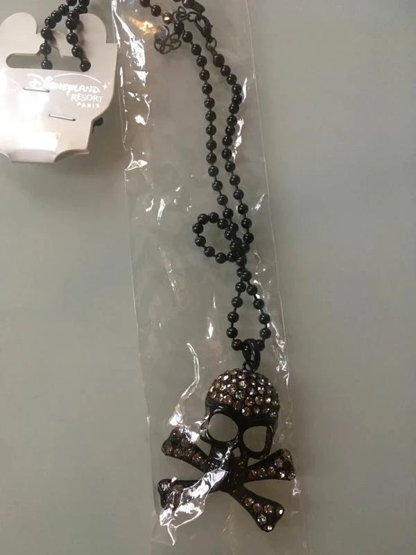 Collier tête de mort / pirate disney disneyland paris avec strass - neuf